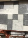 We debated a number of tiles and settled on this - $11.99 for each 12 by 12 square.
